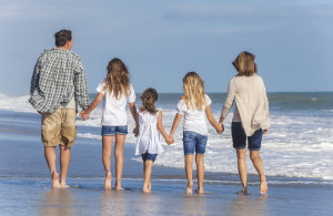 Family Parents Girl Children Walking on Beach